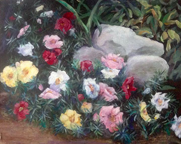 Flowers and stones along drive